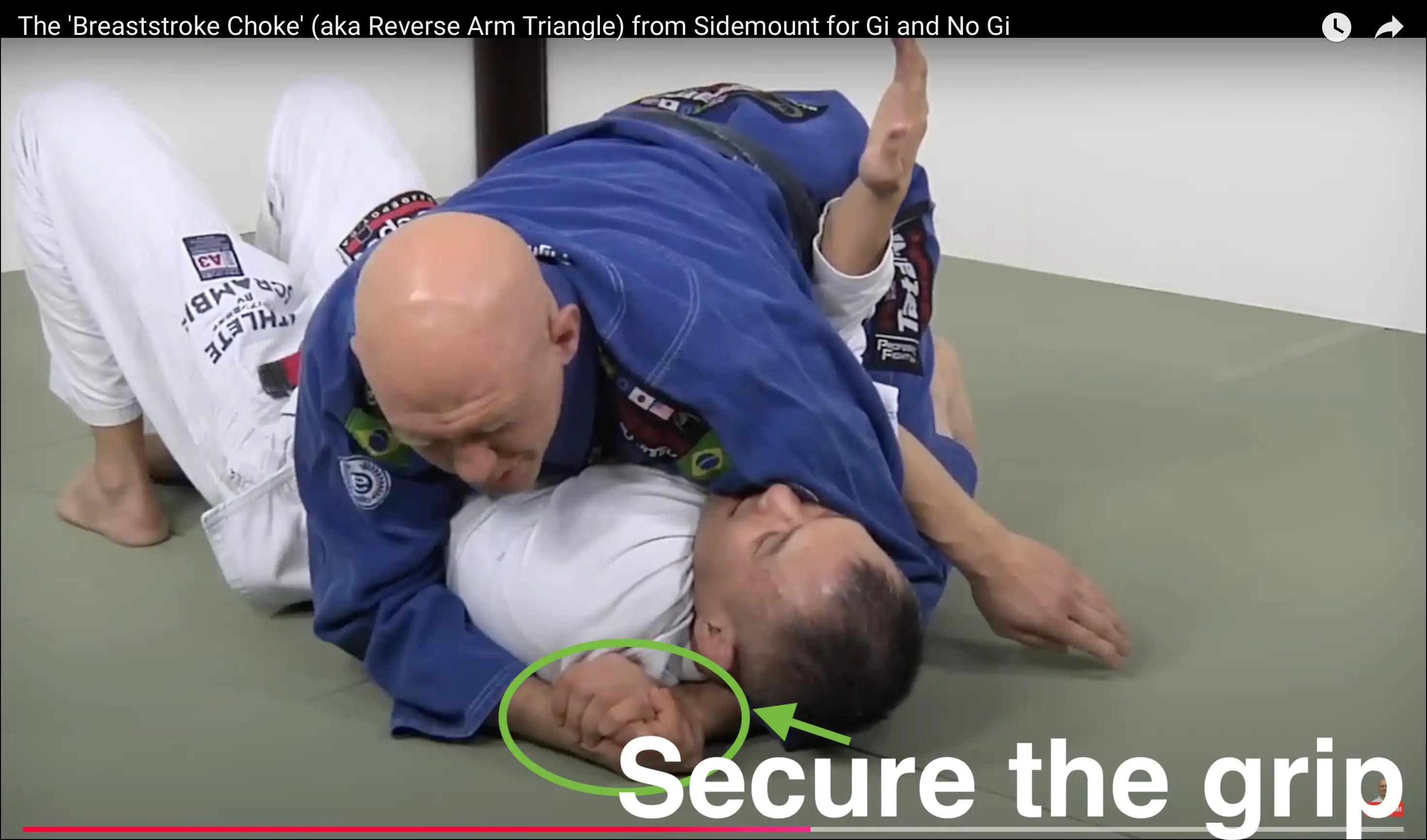 image of reverse arm triangle securing the grip